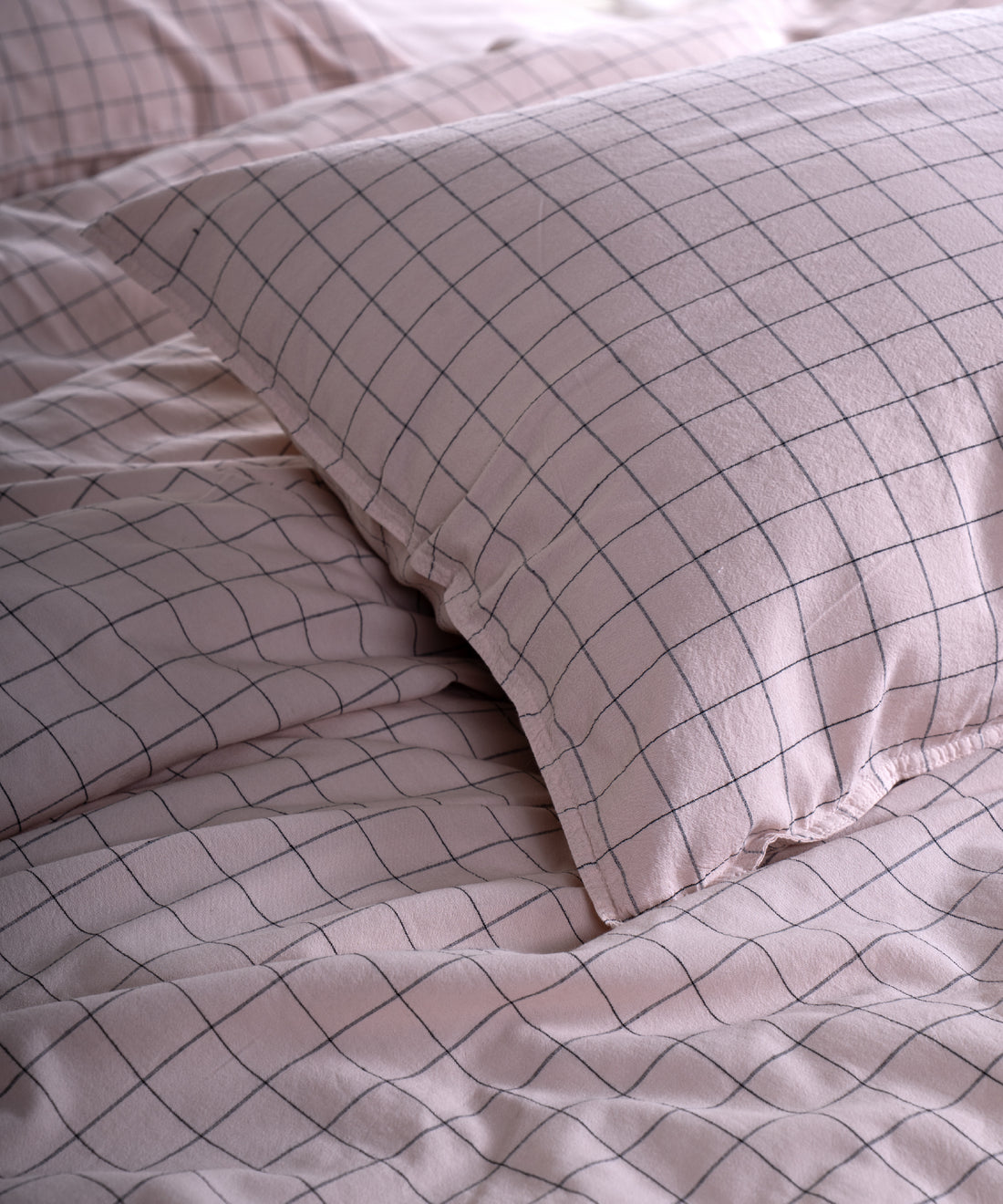 Close-up of stonewashed 100% cotton fabric texture in Pristine colour with soft natural finish